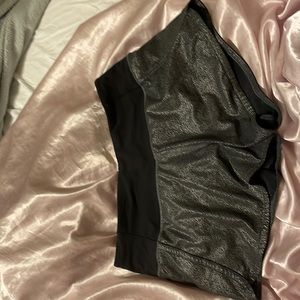 Silver and black Lululemon shorts size 4. I've only wore them 1 time.